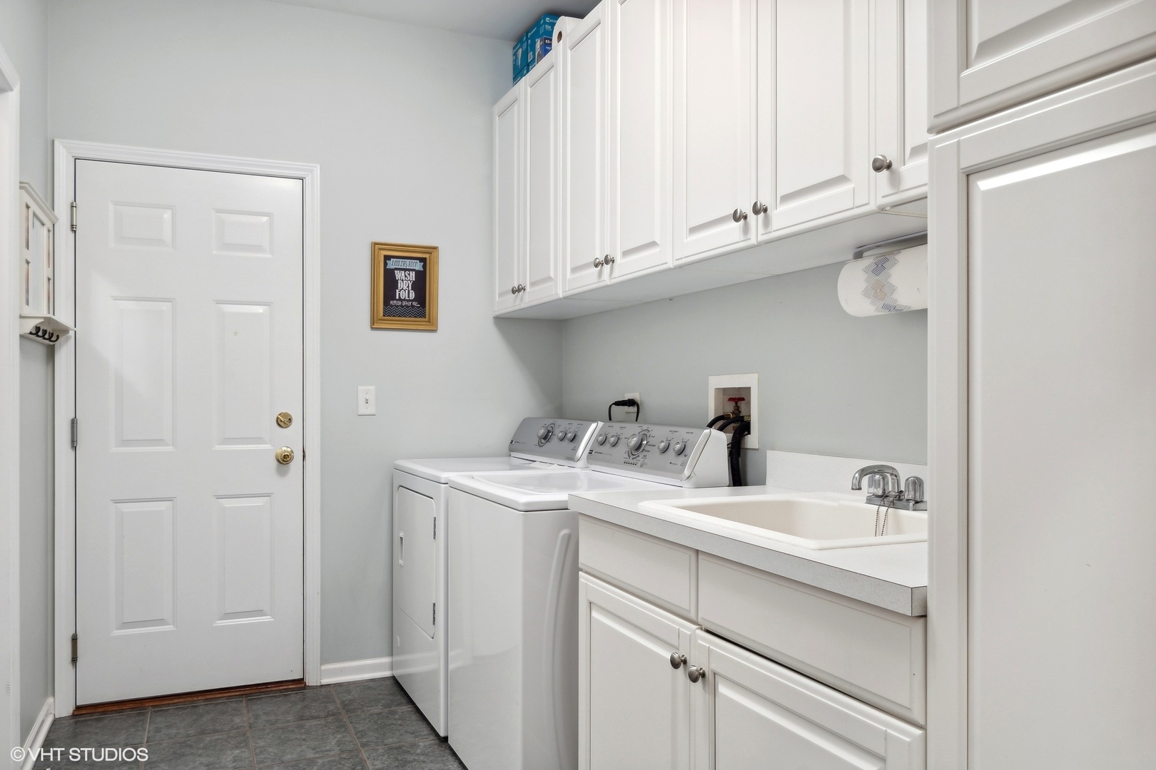 2013 Royal Ridge Drive Northbrook, IL 60062 - Photo 16 of 43 a bathroom with a sink and a white cabinet