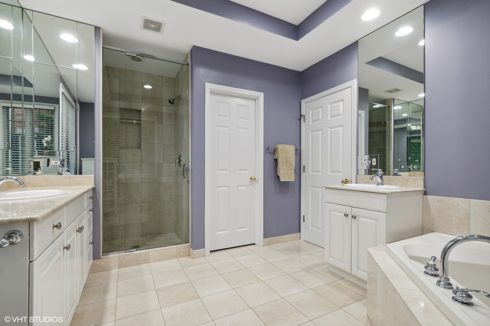 2013 Royal Ridge Drive Northbrook, IL 60062 - Photo 18 of 43 a spacious bathroom with a sink a mirror and a shower