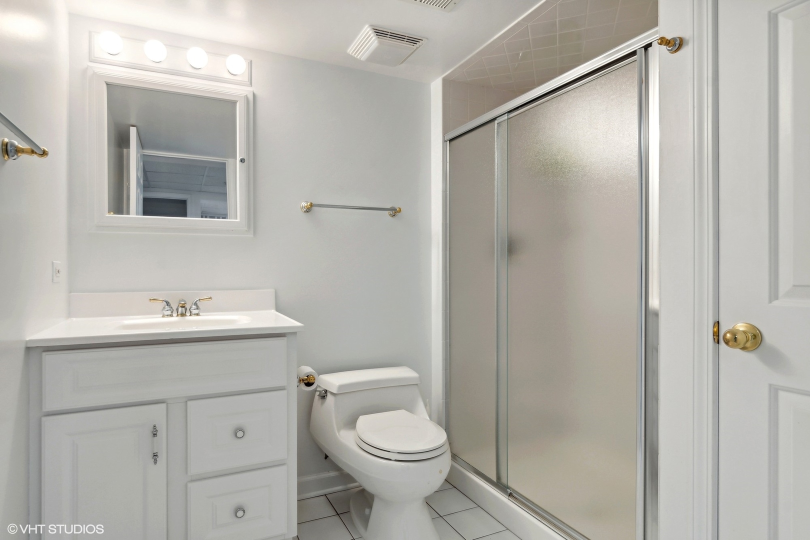 2013 Royal Ridge Drive Northbrook, IL 60062 - Photo 27 of 43 a bathroom with a sink toilet and shower