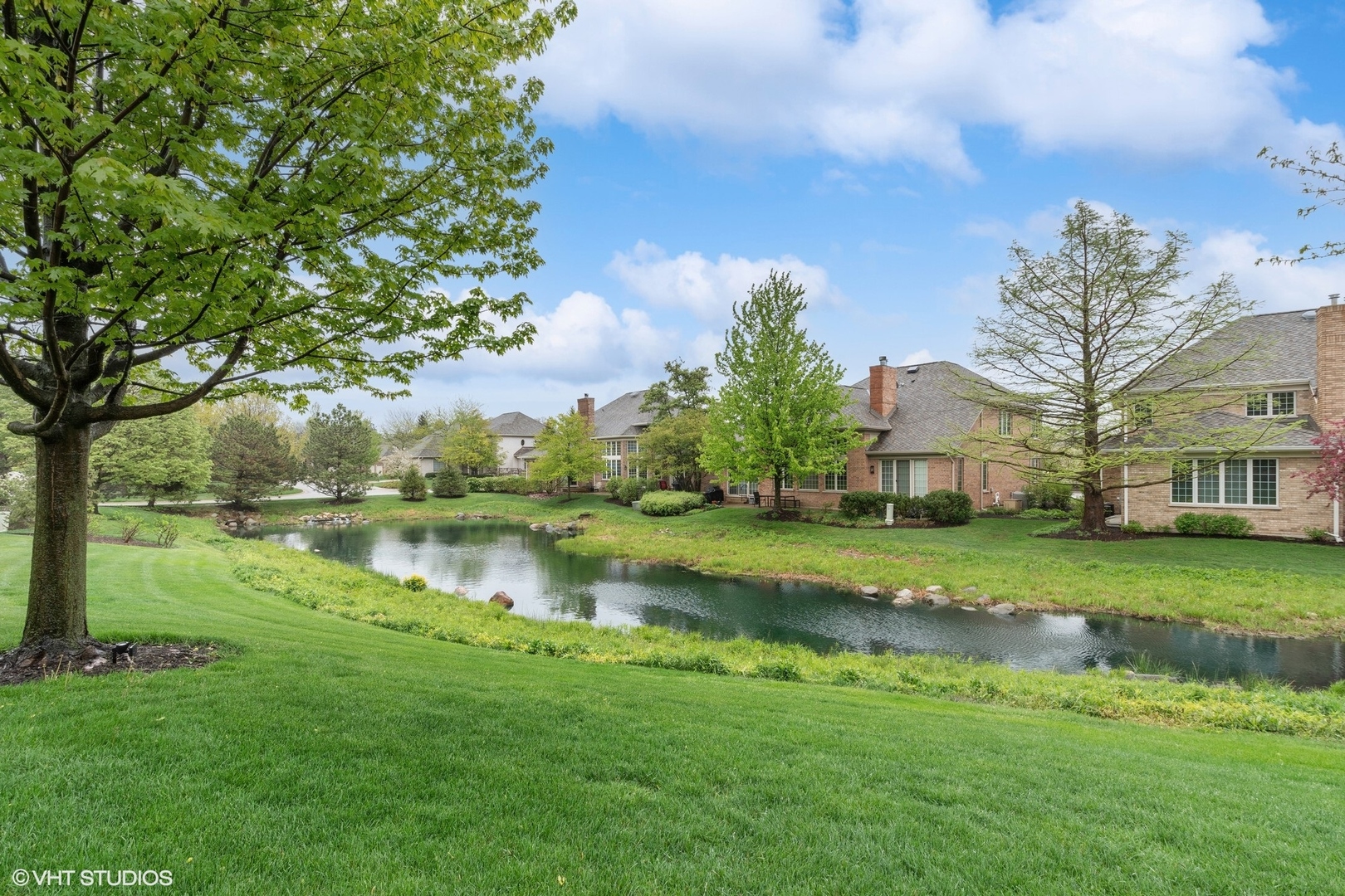 2013 Royal Ridge Drive Northbrook, IL 60062 - Photo 3 of 43 a view of a house with a yard and a fountain