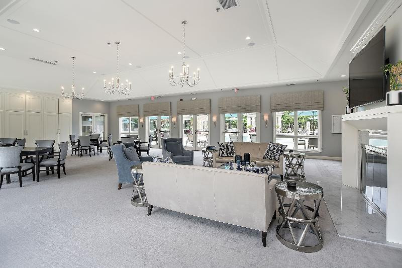 2013 Royal Ridge Drive Northbrook, IL 60062 - Photo 38 of 43 a living room with furniture a fireplace and a flat screen tv