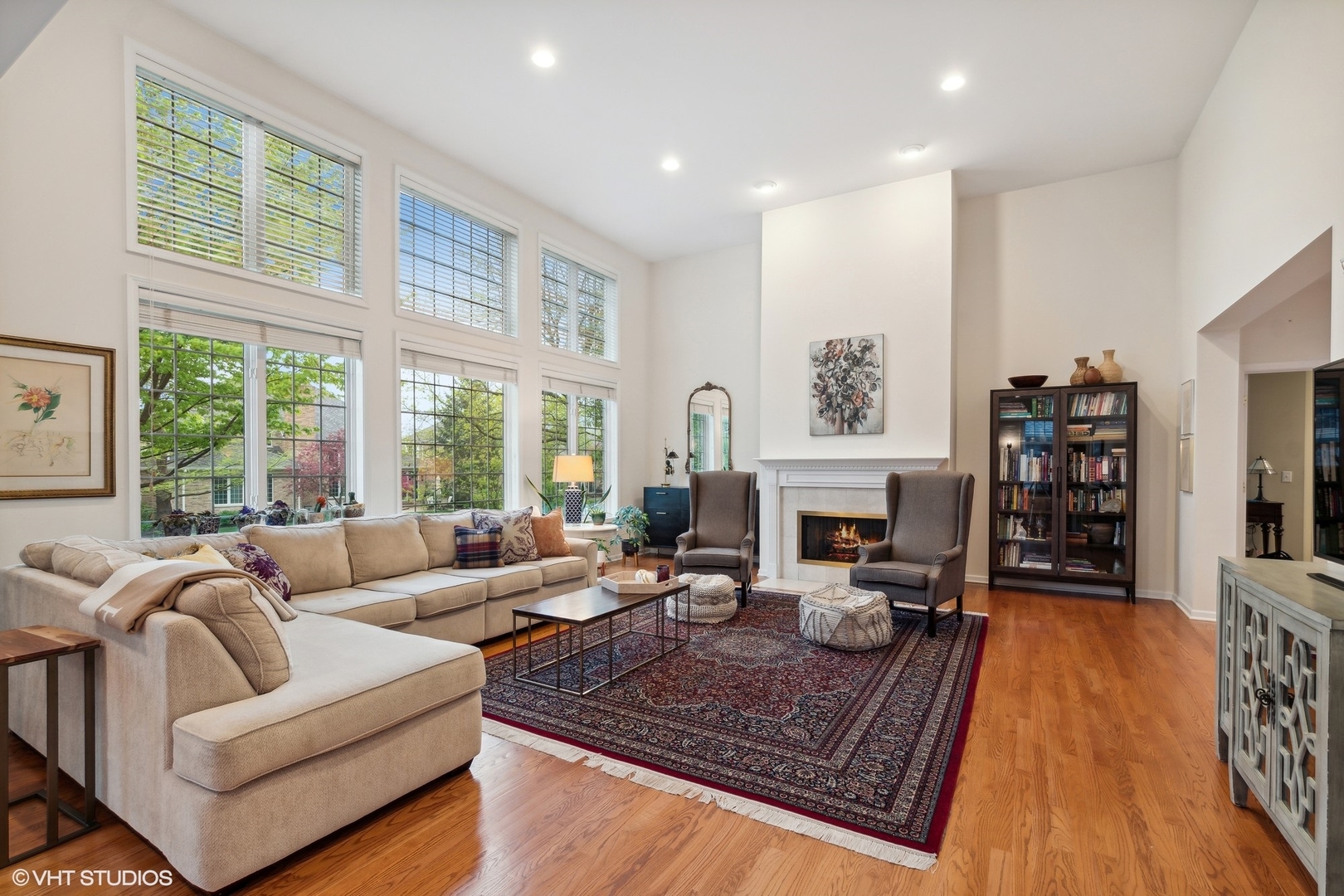 2013 Royal Ridge Drive Northbrook, IL 60062 - Photo 6 of 43 a living room with furniture large window and a fireplace
