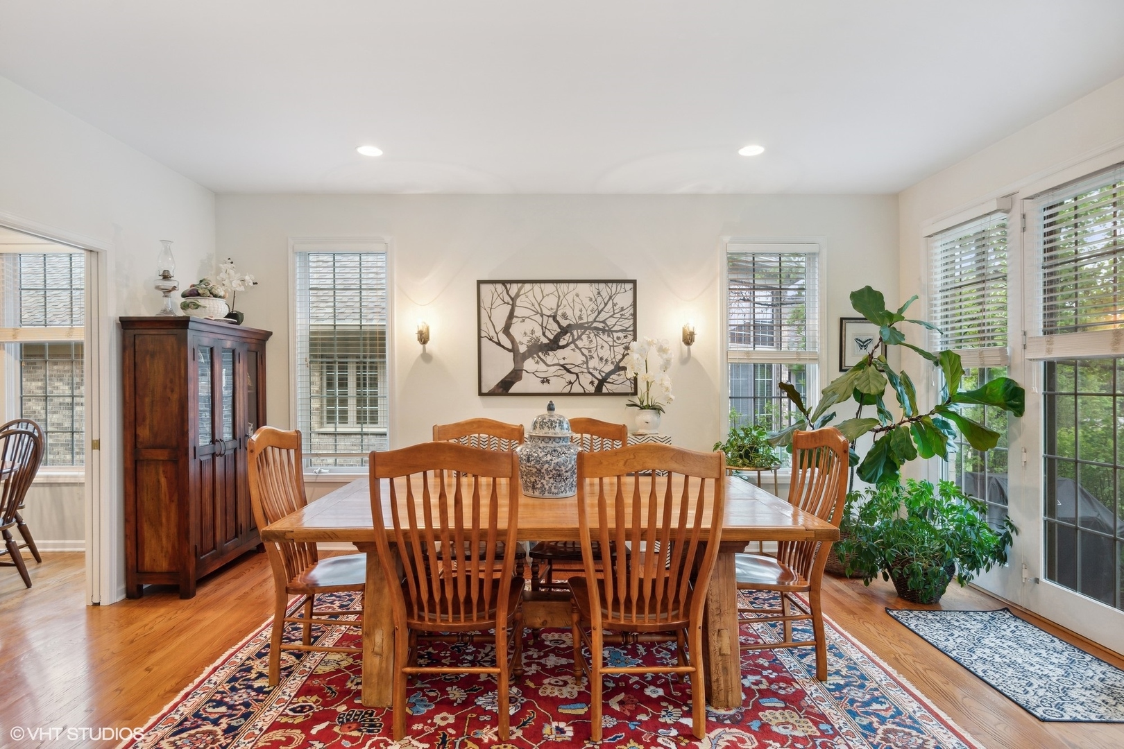 2013 Royal Ridge Drive Northbrook, IL 60062 - Photo 10 of 43 a view of a dining room with furniture window and wooden floor