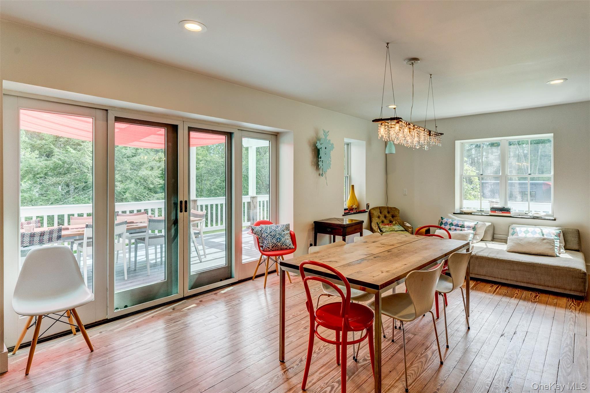39 Deep Hollow Hill Road Narrowsburg, NY 12764 - Photo 12 of 47 a view of a dining room with furniture window and wooden floor
