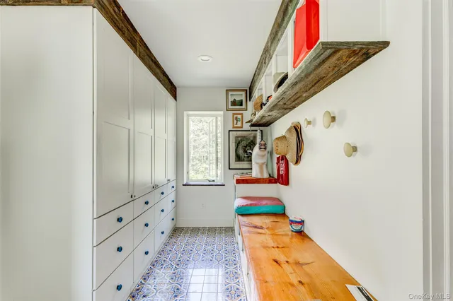 a room with window and furniture