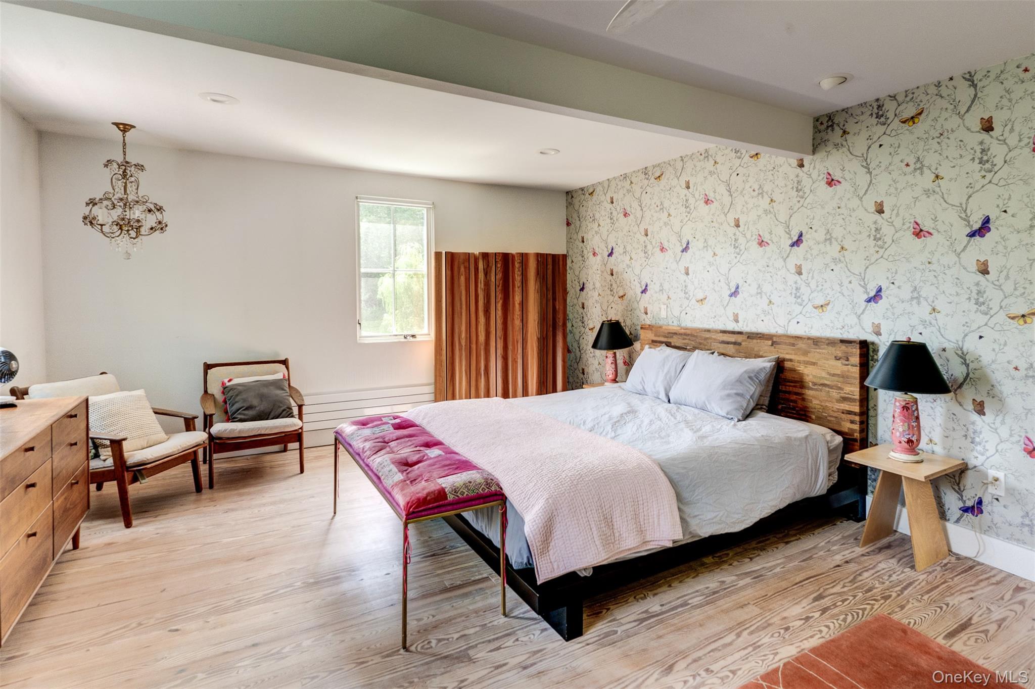 39 Deep Hollow Hill Road Narrowsburg, NY 12764 - Photo 23 of 47 a bedroom with bed and wooden floor