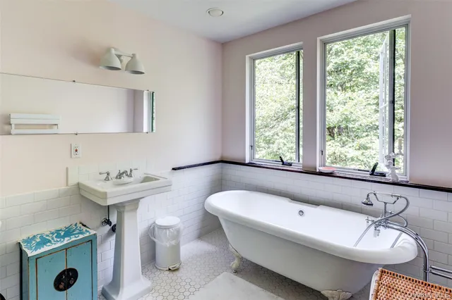 a bathroom with a sink and a bathtub