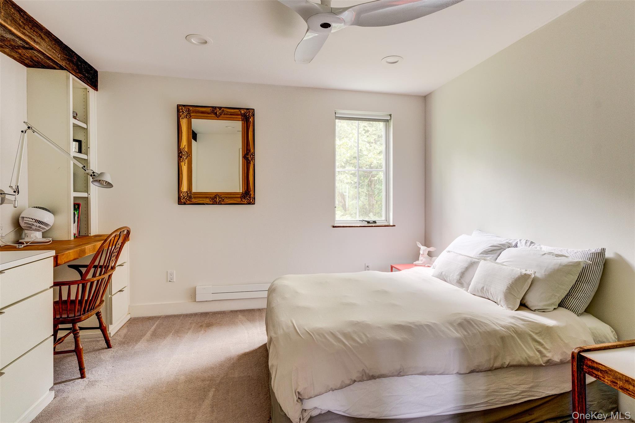 39 Deep Hollow Hill Road Narrowsburg, NY 12764 - Photo 25 of 47 a bedroom with a bed chair and window