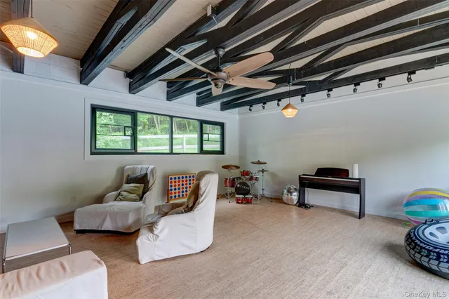 a bedroom with furniture and a couch