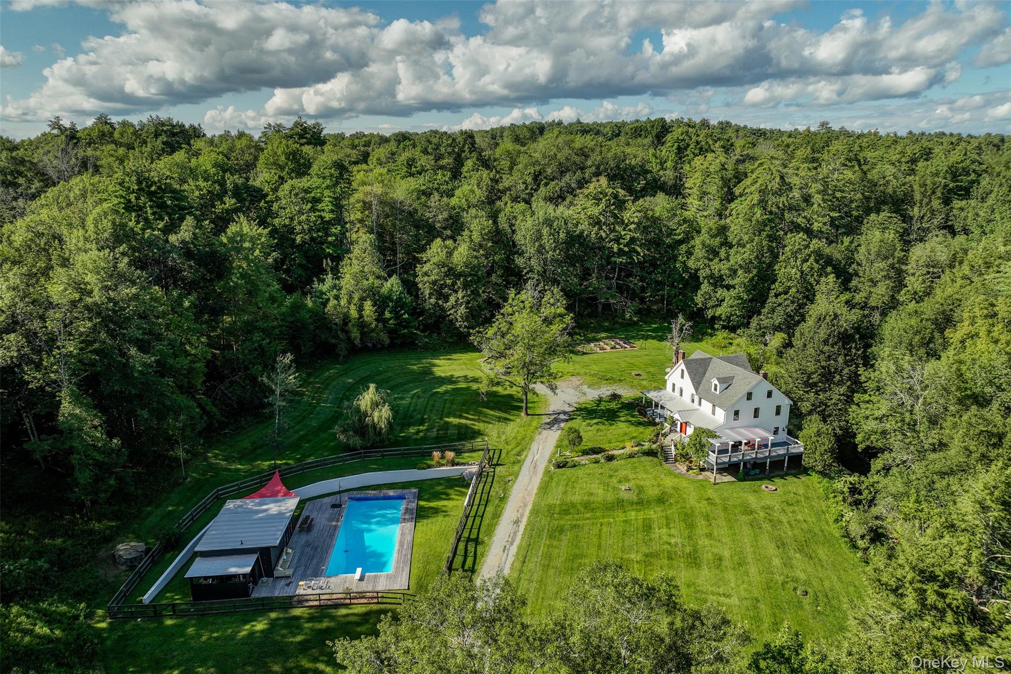 39 Deep Hollow Hill Road Narrowsburg, NY 12764 - Photo 46 of 47 a backyard of a house with lots of green space
