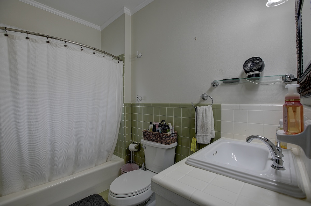 1708 Olive Street Georgetown, TX 78626 - Photo 28 of 38 Downstairs bathroom in main house. Features a window for more great natural lighting