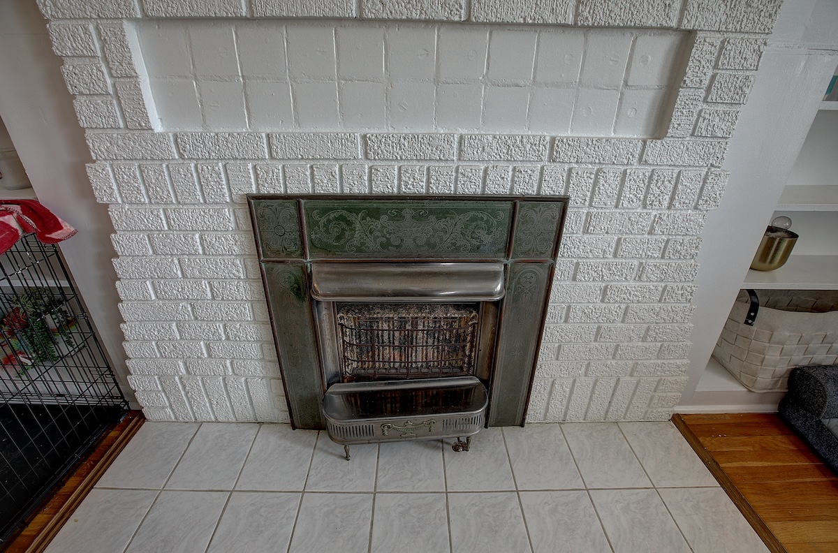 1708 Olive Street Georgetown, TX 78626 - Photo 3 of 38 Beautiful fireplace, adorns the family room in the main house.