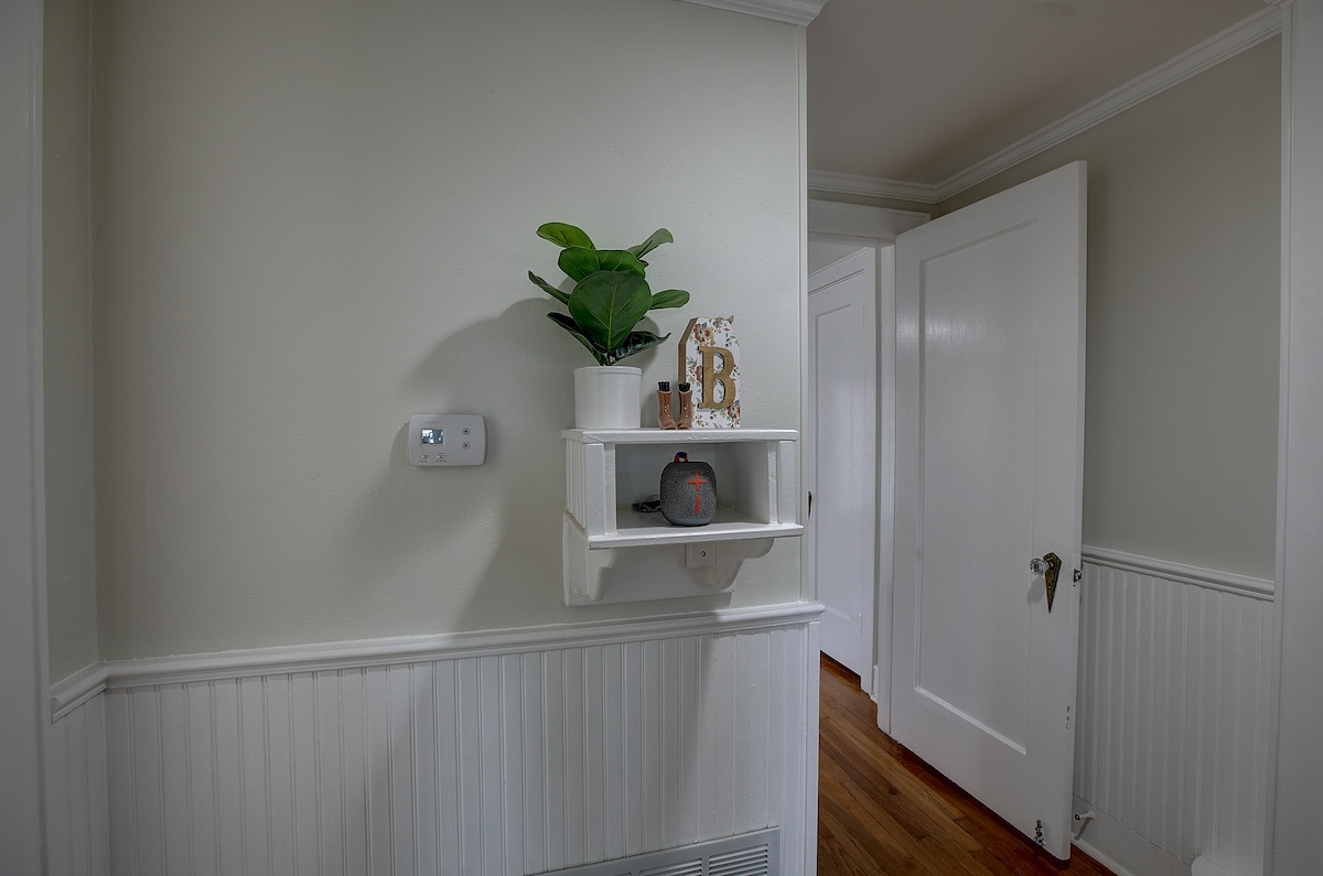 1708 Olive Street Georgetown, TX 78626 - Photo 33 of 38 Charming historic features like a phone stand. As Alexander Graham Bell said, he could see the day when every town had a phone!