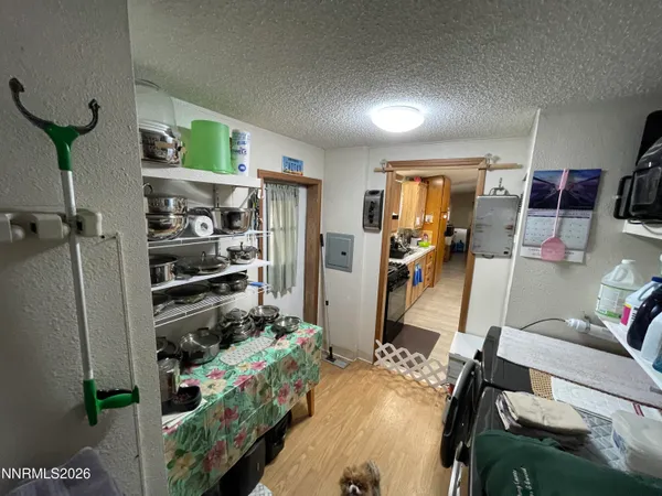 a bedroom with furniture and a book shelf