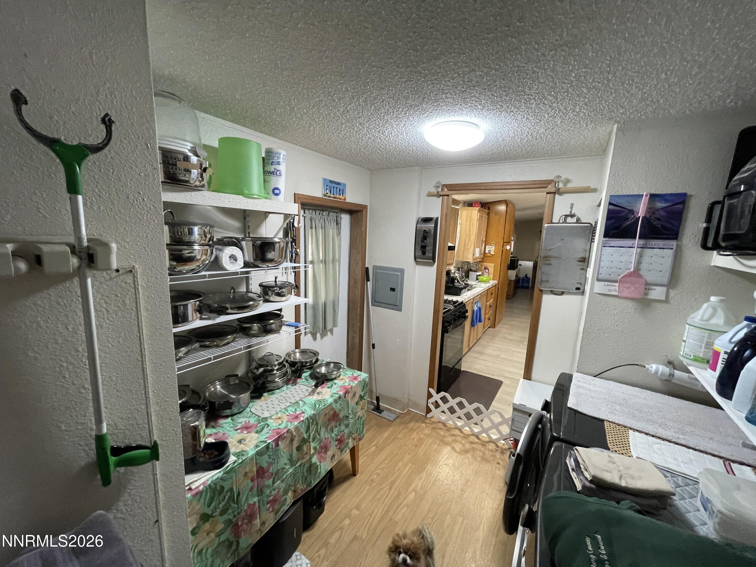 795 16th Street Lovelock, NV 89419 - Photo 11 of 28 a bedroom with furniture and a book shelf