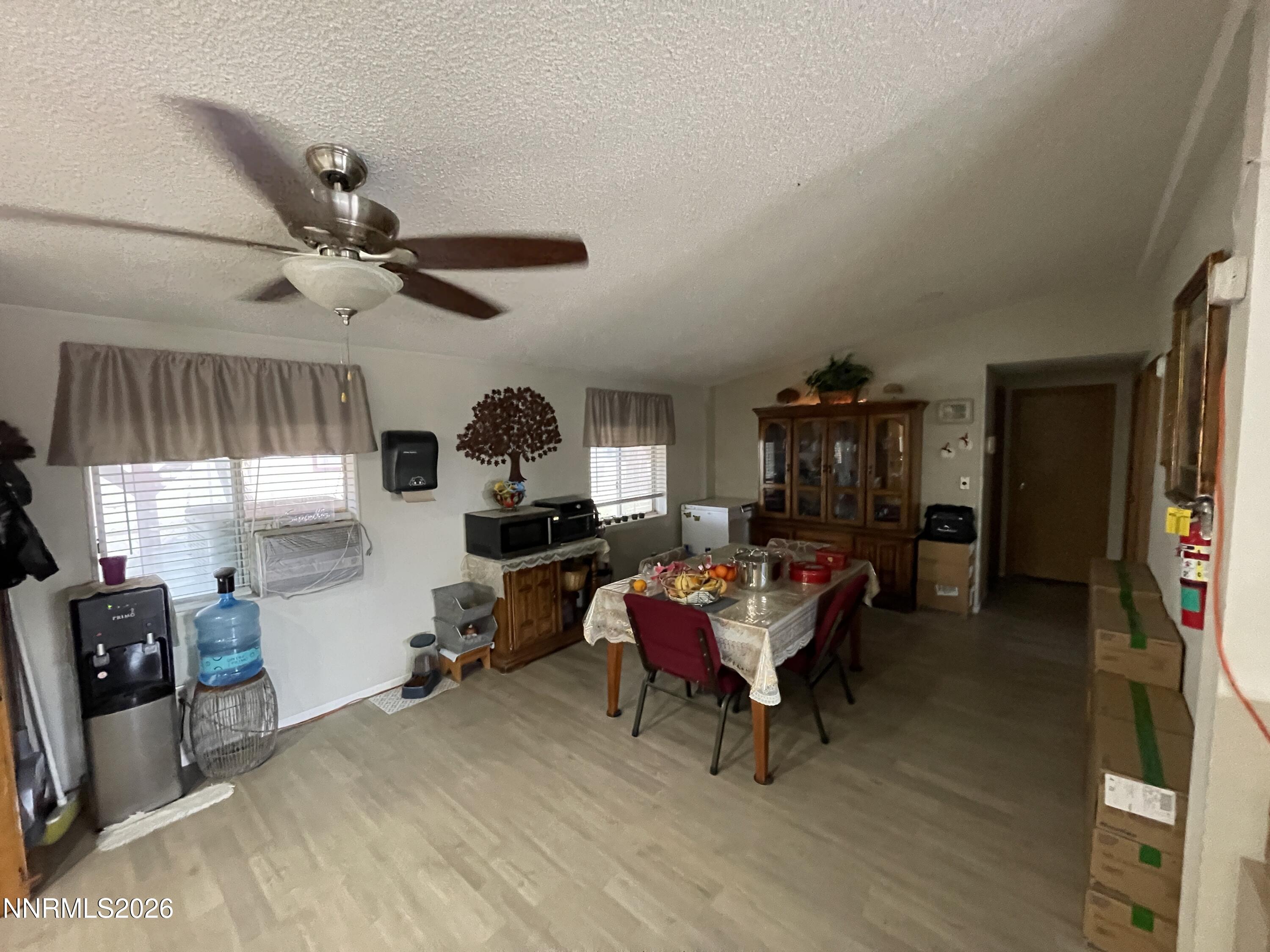 795 16th Street Lovelock, NV 89419 - Photo 12 of 28 a living room with furniture a air conditioner vent and a window