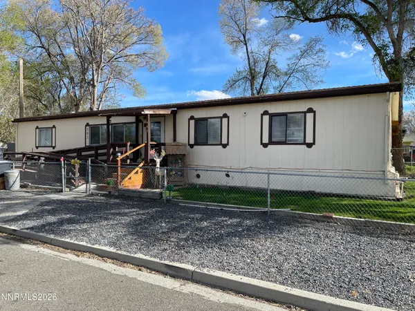 a view of back yard of a house