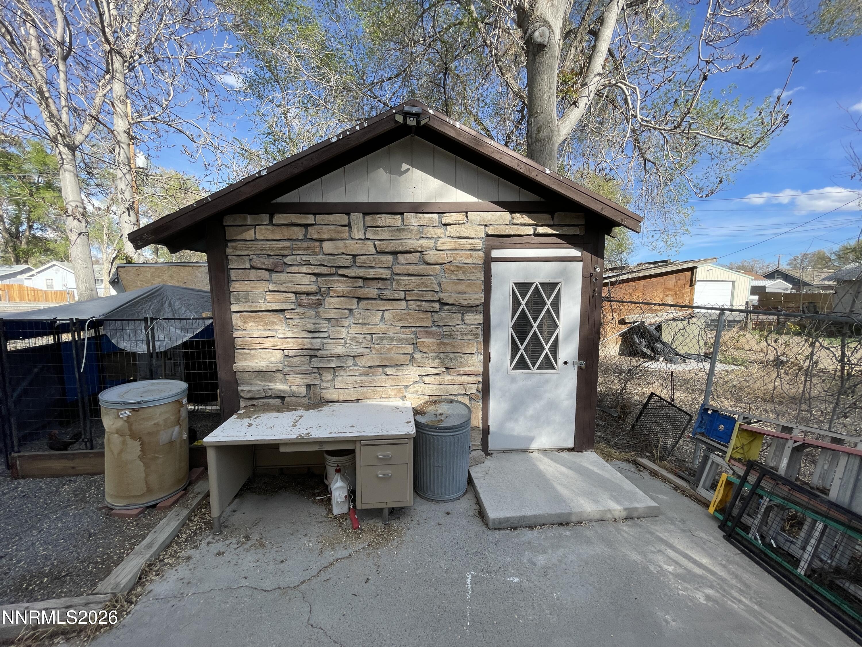 795 16th Street Lovelock, NV 89419 - Photo 25 of 28 a front view of a house with a yard