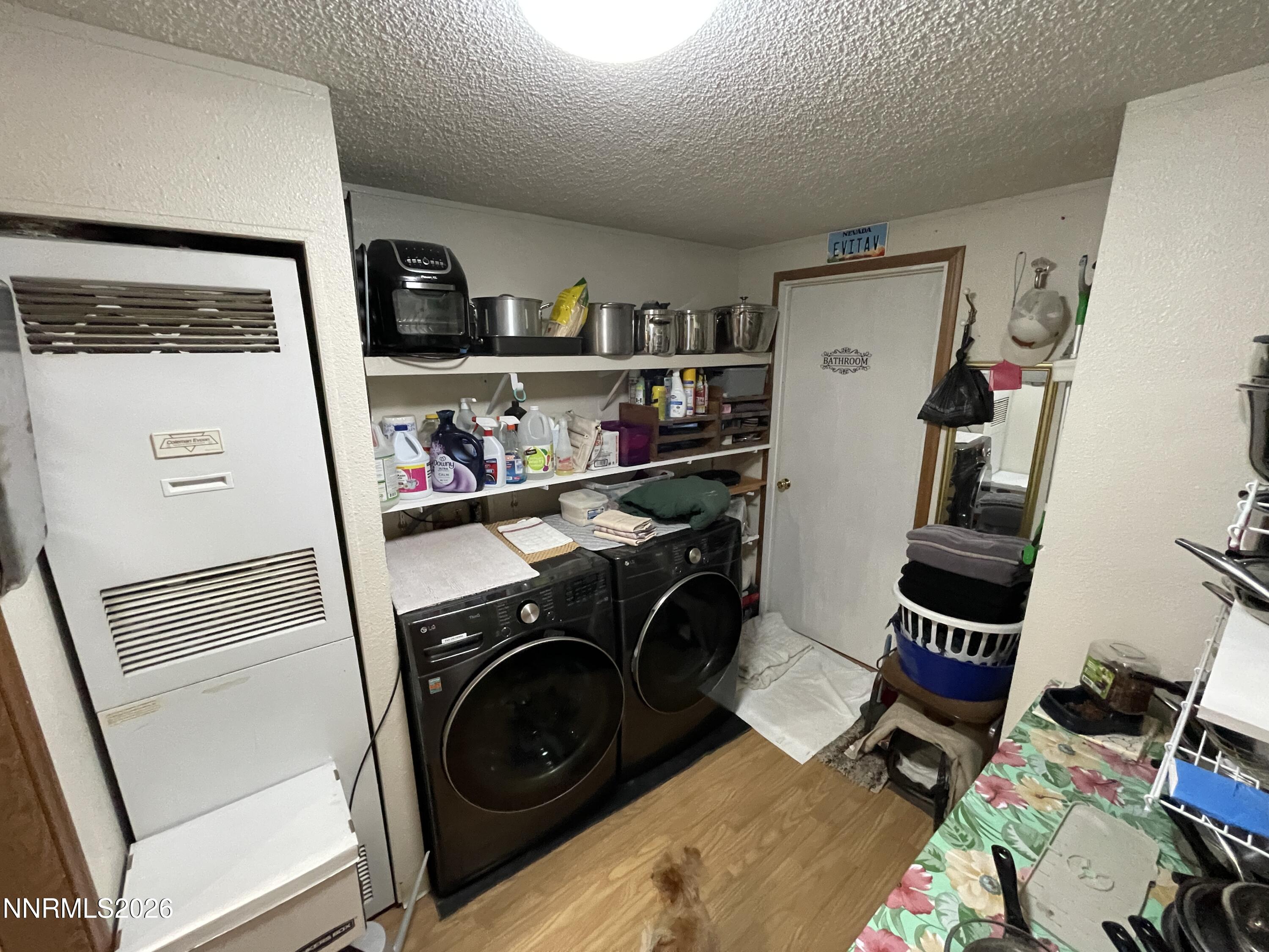 795 16th Street Lovelock, NV 89419 - Photo 10 of 28 a view of a storage & utility room with washer and dryer