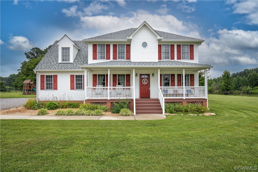 15803 Loving Union Road Disputanta, VA 23842 - Photo 1 of 39 a front view of a house with a yard