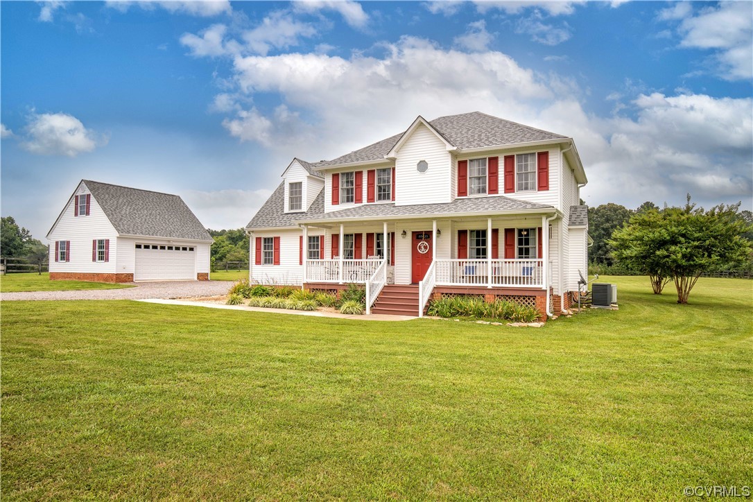 15803 Loving Union Road Disputanta, VA 23842 - Photo 2 of 39 a front view of a house with a swimming pool