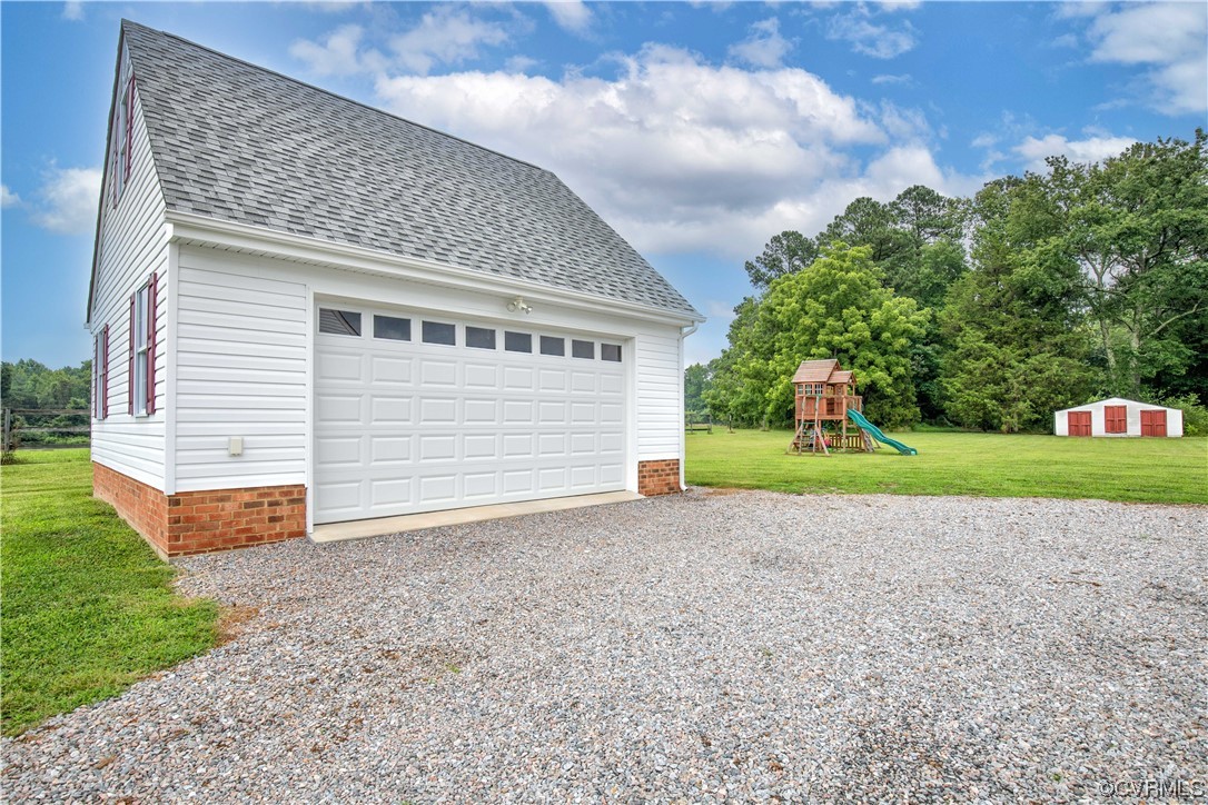 15803 Loving Union Road Disputanta, VA 23842 - Photo 35 of 39 a view of a backyard with a garden