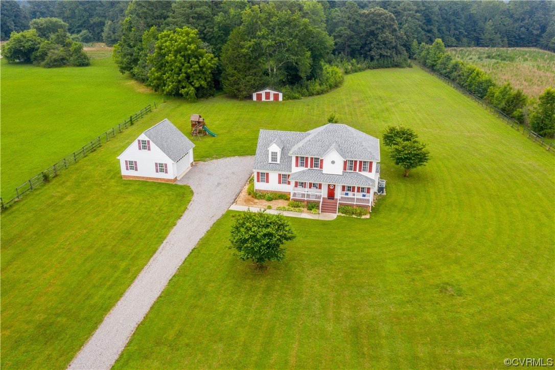 15803 Loving Union Road Disputanta, VA 23842 - Photo 4 of 39 a view of a house with a big yard