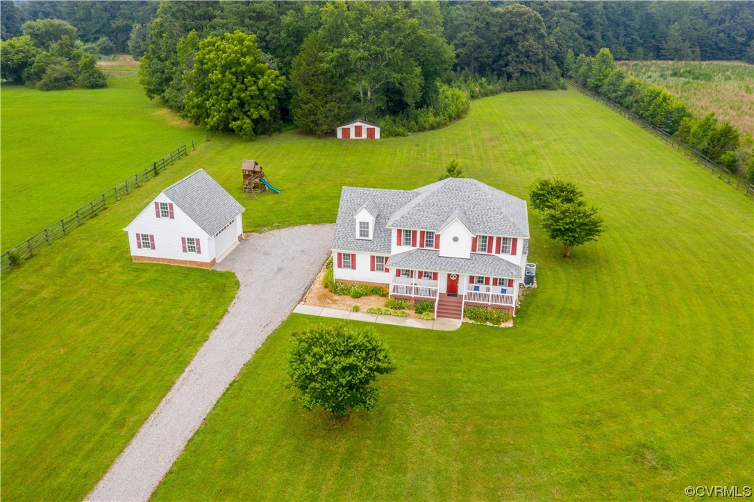 15803 Loving Union Road Disputanta, VA 23842 - Photo 5 of 39 an aerial view of a house with a garden