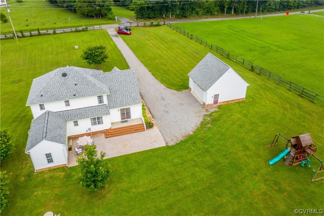 15803 Loving Union Road Disputanta, VA 23842 - Photo 10 of 39 an aerial view of a house with a yard and lake view