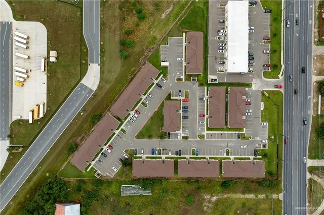 a view of kitchen with granite countertop cabinets and a stove top oven