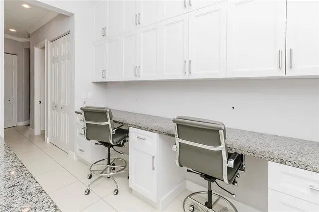 a view of workspace with wooden wall