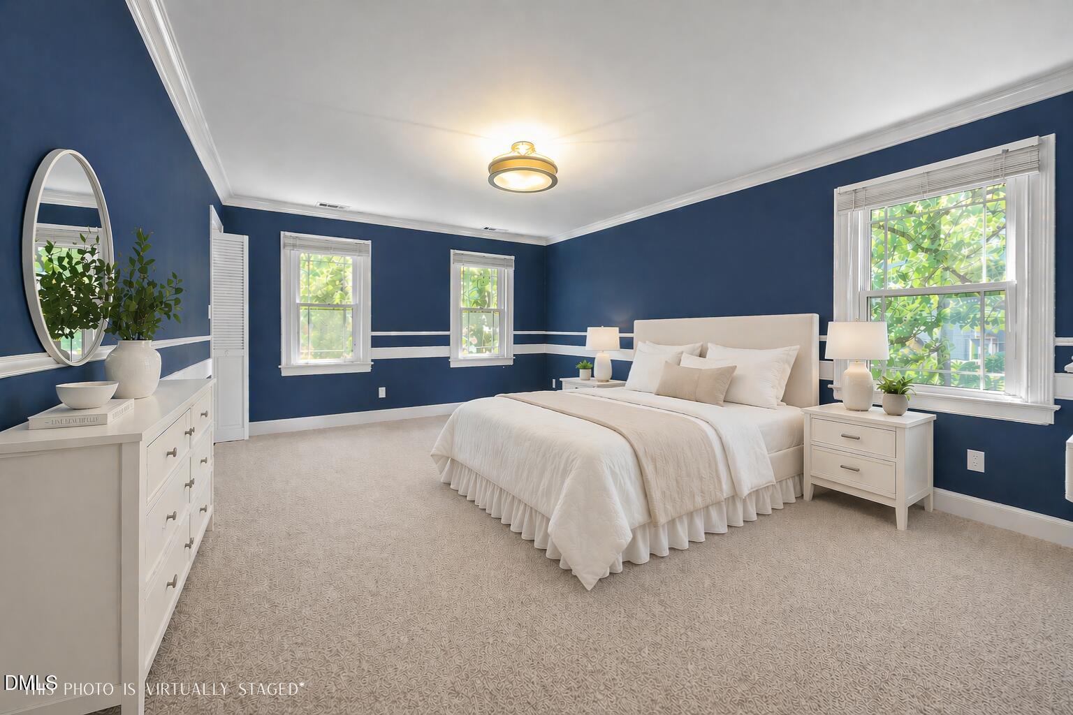 8221 Harps Mill Road Raleigh, NC 27615 - Photo 19 of 46 a bed room with bed and a large window