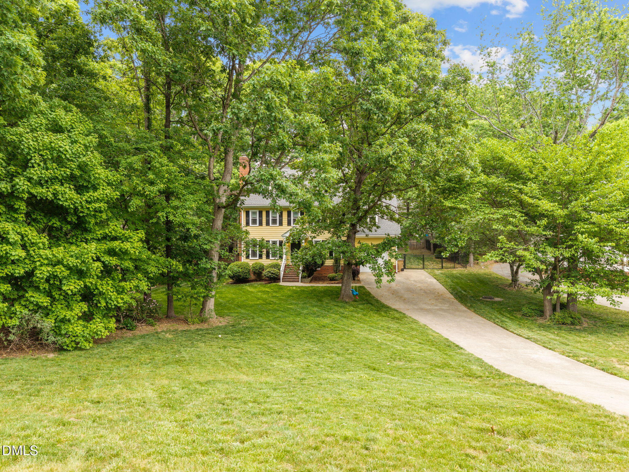 8221 Harps Mill Road Raleigh, NC 27615 - Photo 44 of 46 a view of a trees in a yard