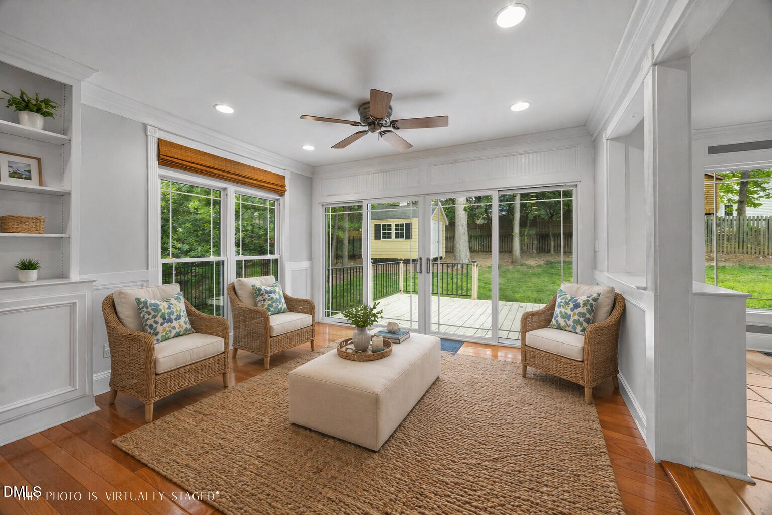 8221 Harps Mill Road Raleigh, NC 27615 - Photo 8 of 46 a living room with furniture and large windows