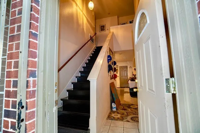 a view of room with hardwood and window