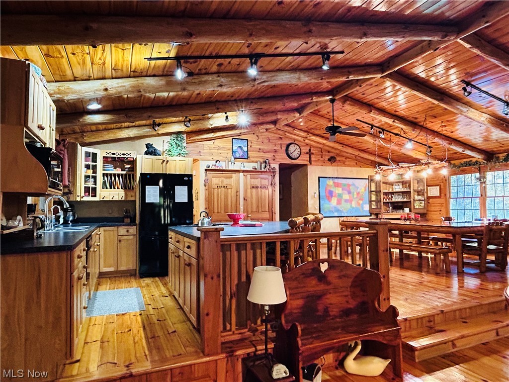 17367 Reeves Road Middlefield, OH 44062 - Photo 14 of 35 Kitchen with sink, light wood-type flooring, ceiling fan, and wood ceiling
