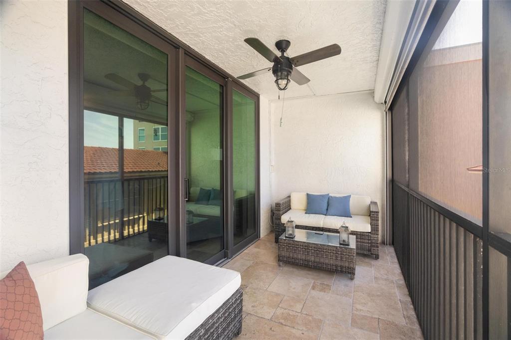 14900 Gulf Boulevard, Unit 202 Madeira Beach, FL 33708 - Photo 25 of 37 a living room with furniture