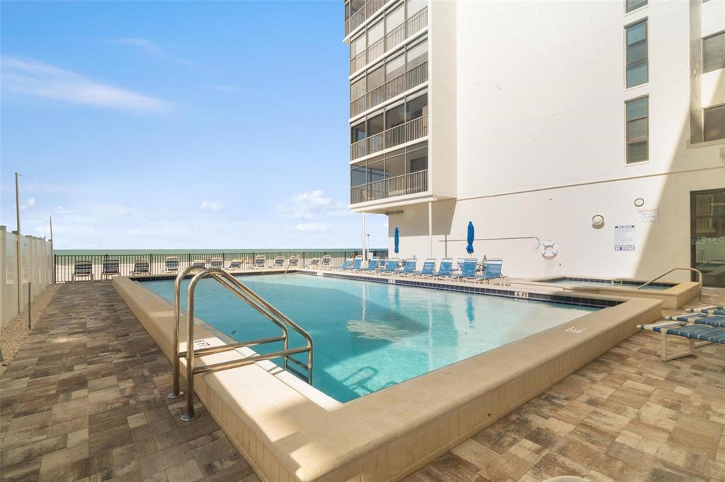 14900 Gulf Boulevard, Unit 202 Madeira Beach, FL 33708 - Photo 28 of 37 a view of a swimming pool with a lake
