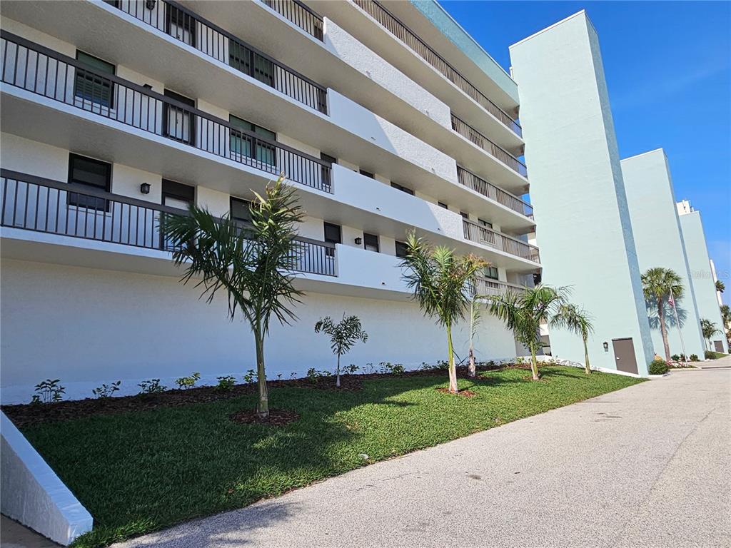14900 Gulf Boulevard, Unit 202 Madeira Beach, FL 33708 - Photo 30 of 37 a view of building with yard