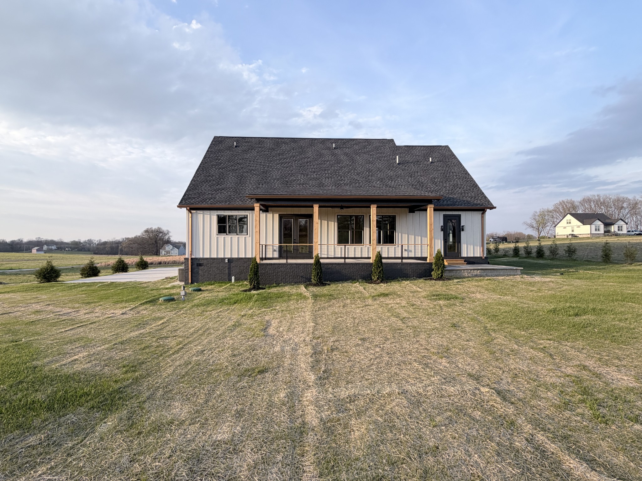 6447 Hopewell Road Springfield, TN 37172 - Photo 11 of 61 a front view of a house with a garden and yard