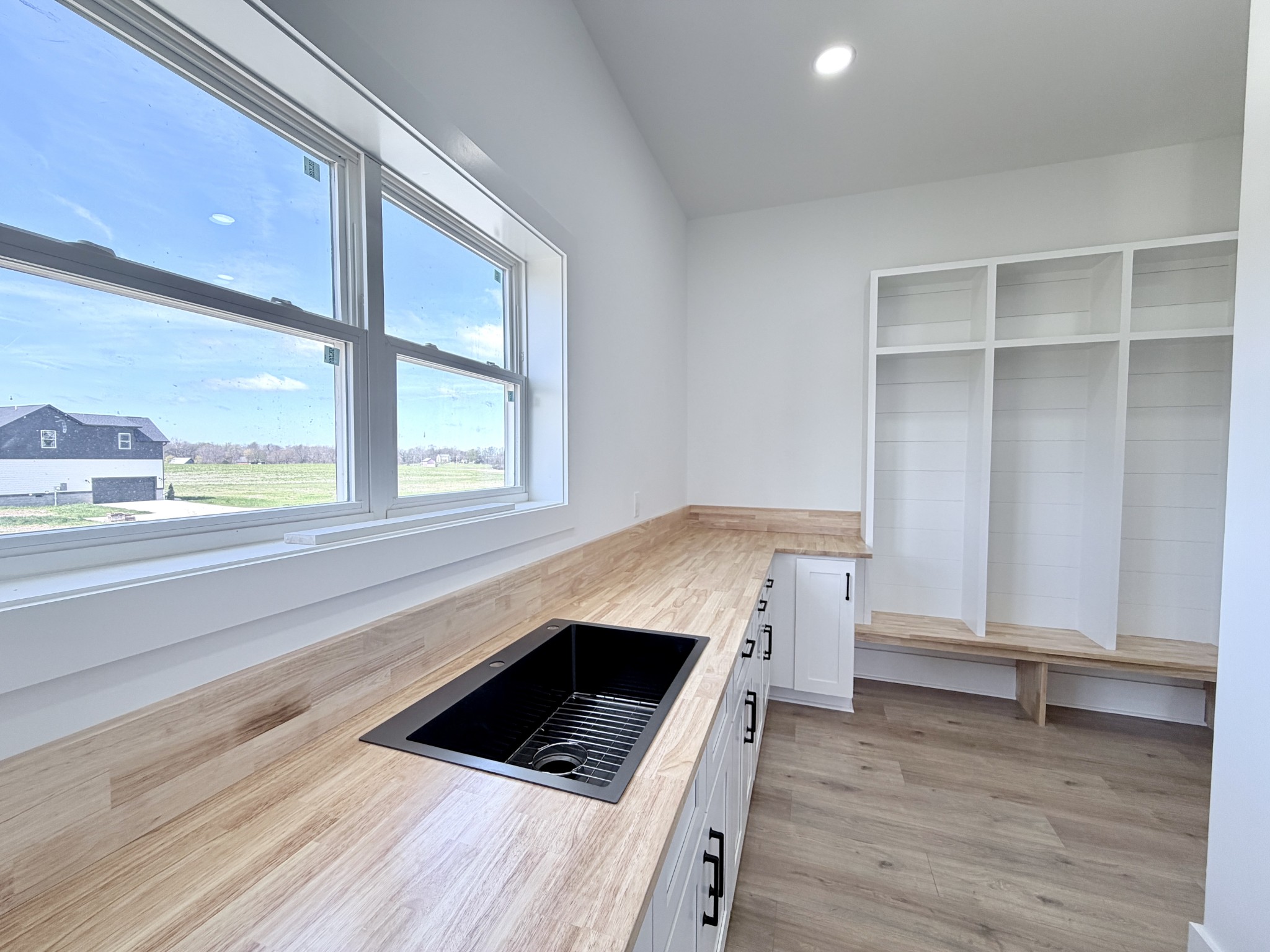 6447 Hopewell Road Springfield, TN 37172 - Photo 23 of 61 a kitchen with a stove a sink and a window