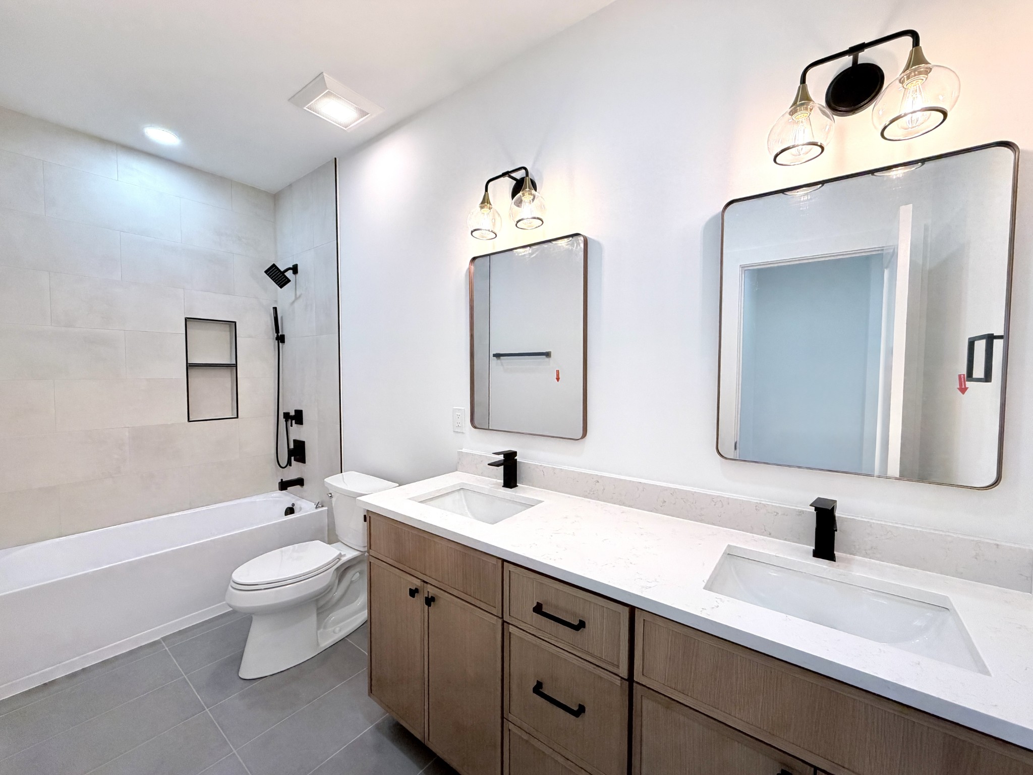 6447 Hopewell Road Springfield, TN 37172 - Photo 24 of 61 a bathroom with 2 sink double vanity and a toilet