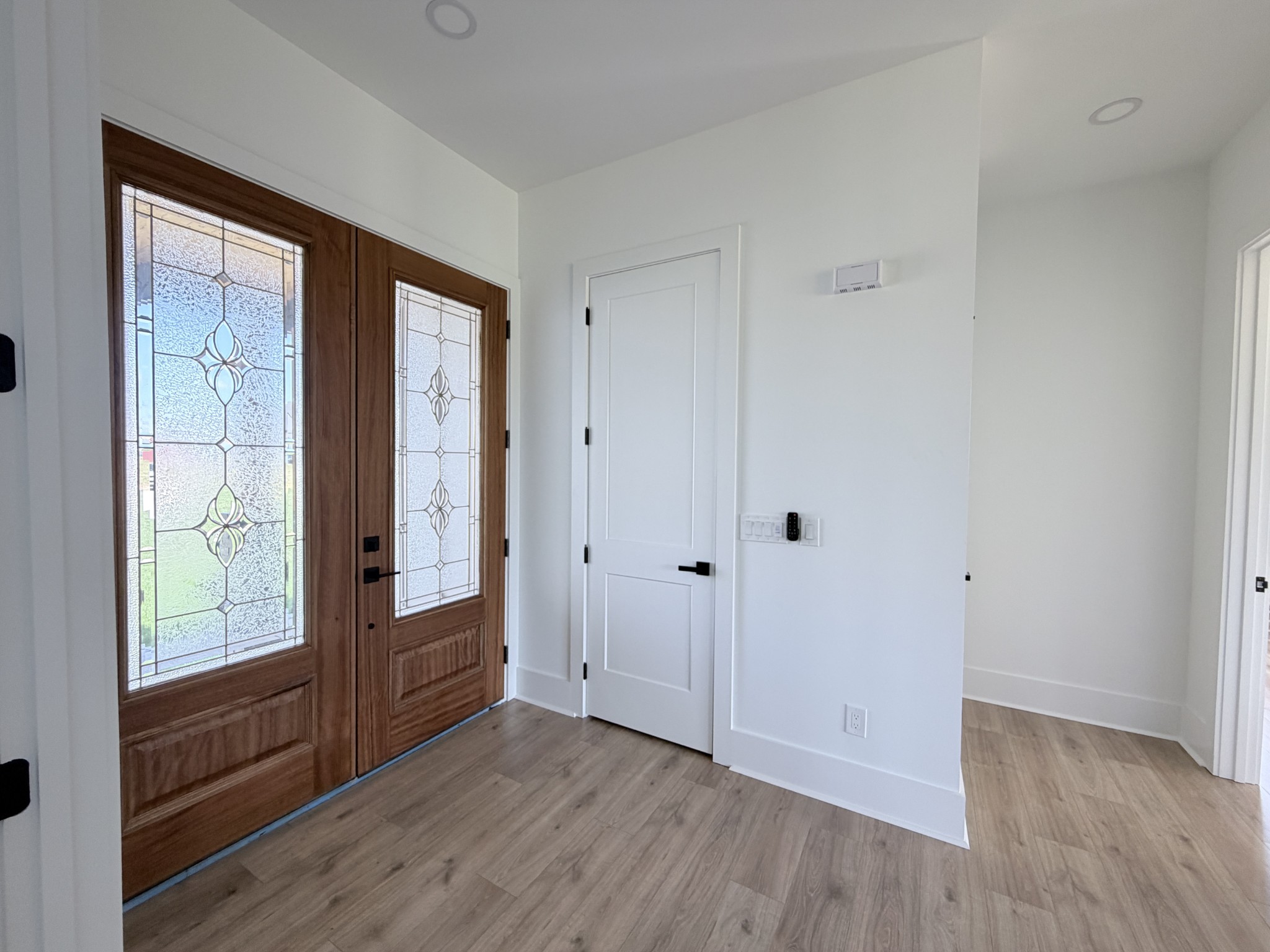 6447 Hopewell Road Springfield, TN 37172 - Photo 27 of 61 a view of an empty room with wooden floor and a window