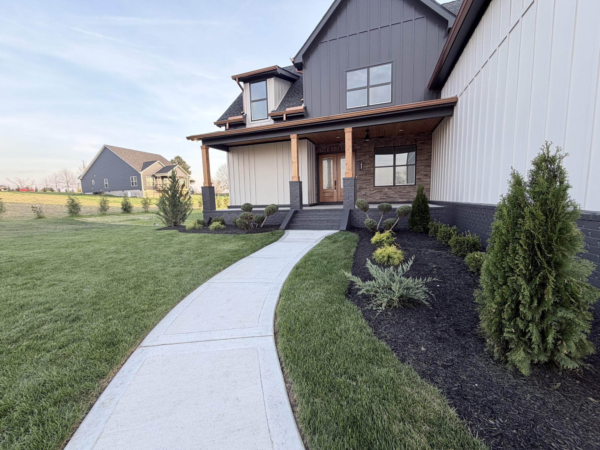 6447 Hopewell Road Springfield, TN 37172 - Photo 4 of 61 a front view of a house with garden