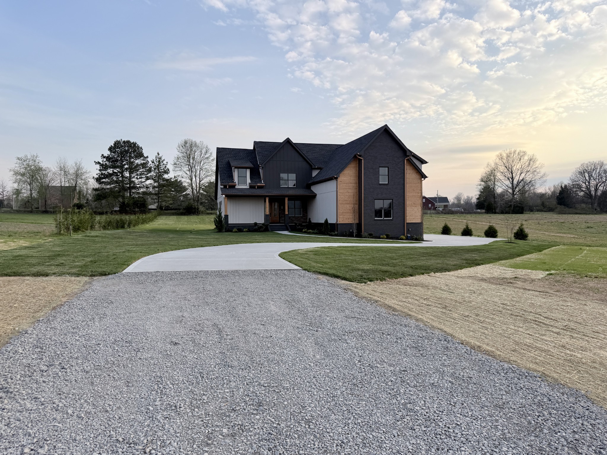 6447 Hopewell Road Springfield, TN 37172 - Photo 5 of 61 a view of a house with a big yard and large trees