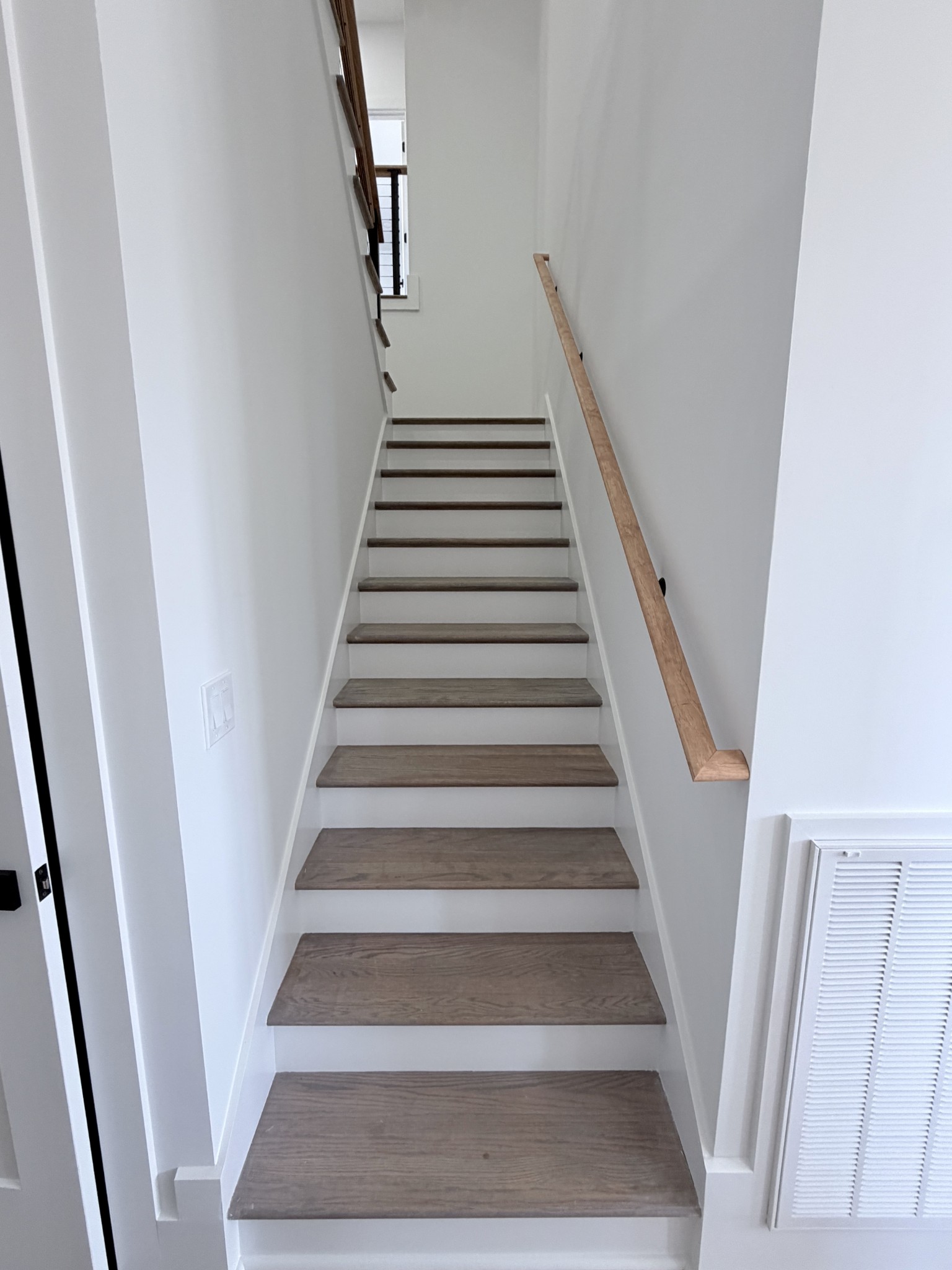 6447 Hopewell Road Springfield, TN 37172 - Photo 52 of 61 a view of staircase with lots of frames on wall