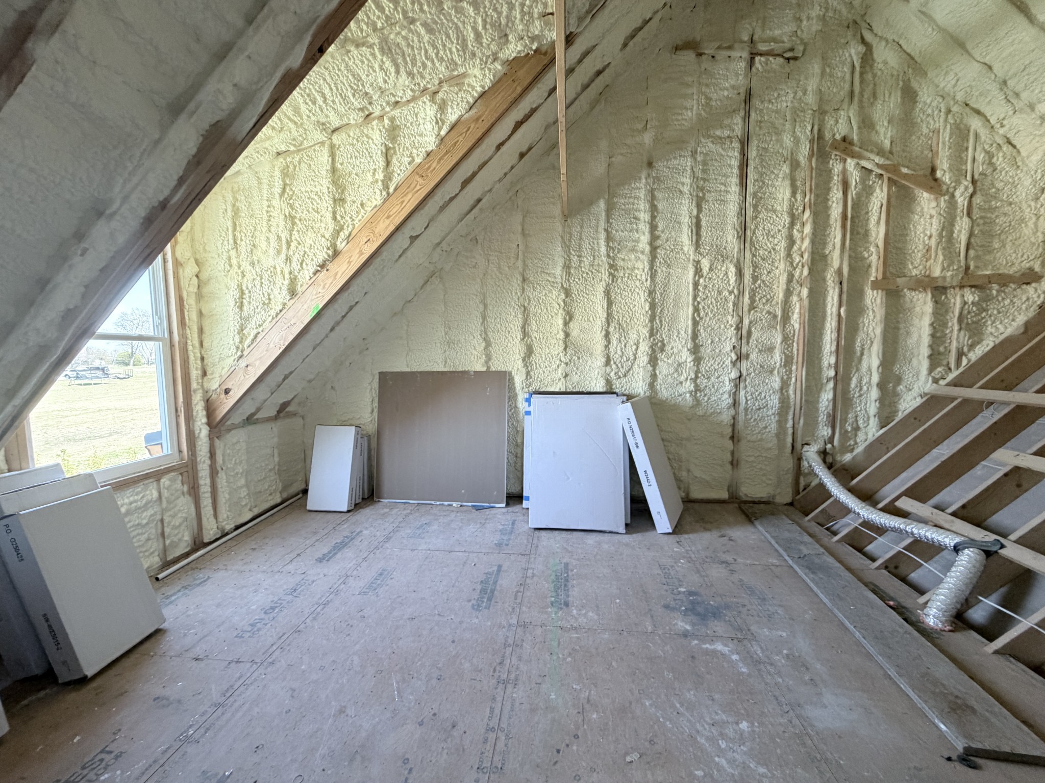 6447 Hopewell Road Springfield, TN 37172 - Photo 57 of 61 a view of an empty room with wooden floor and stairs