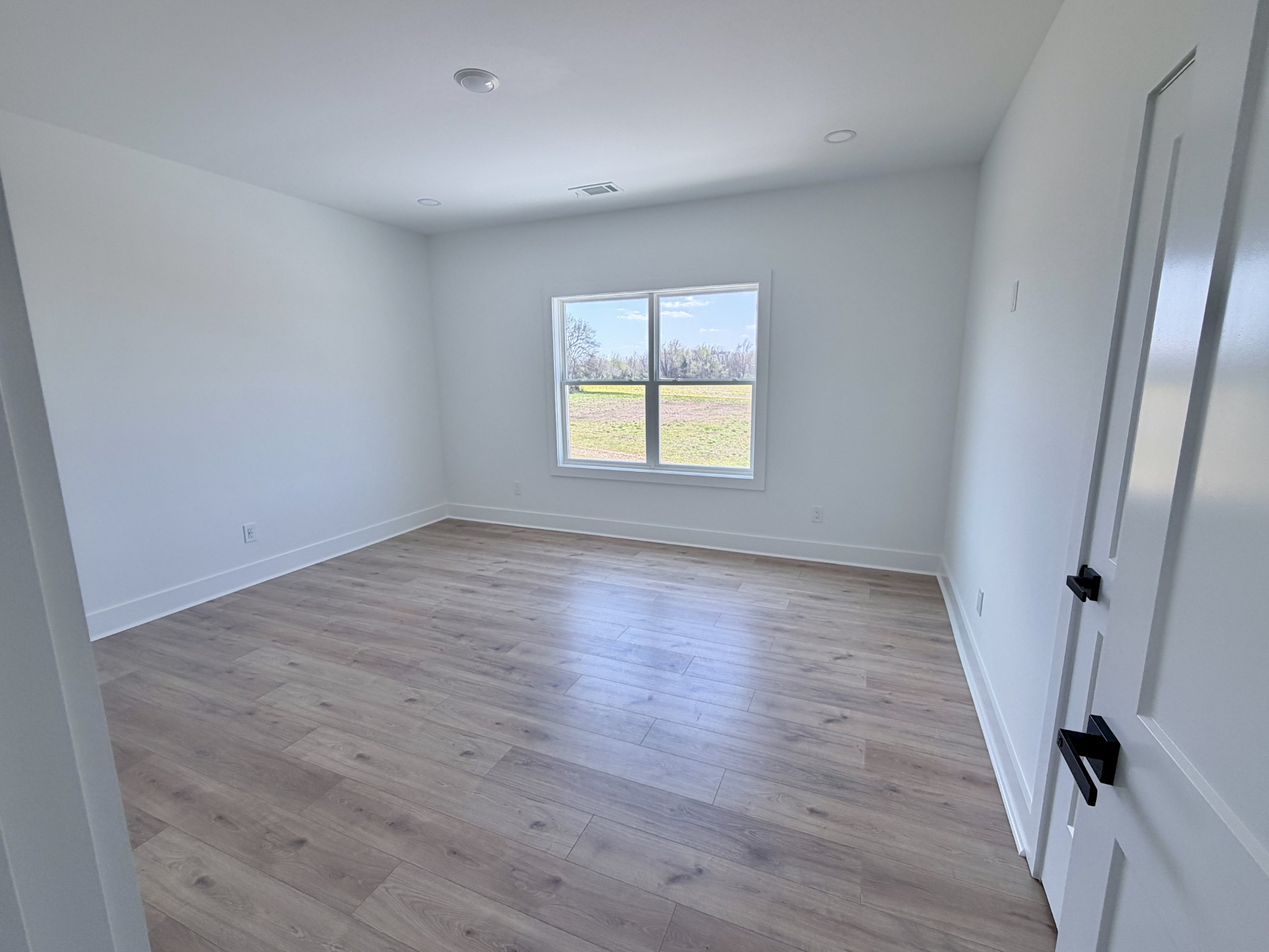 6447 Hopewell Road Springfield, TN 37172 - Photo 61 of 61 wooden floor in an empty room with a window
