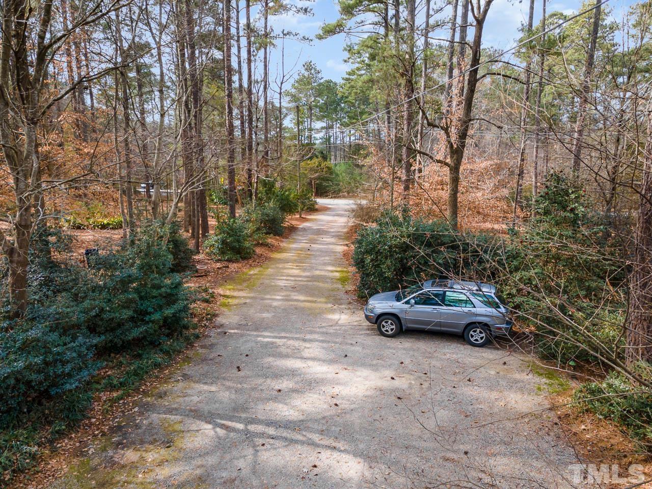 9006 Honeycutt Road Raleigh, NC 27615 - Photo 26 of 54 a view of street with parked cars