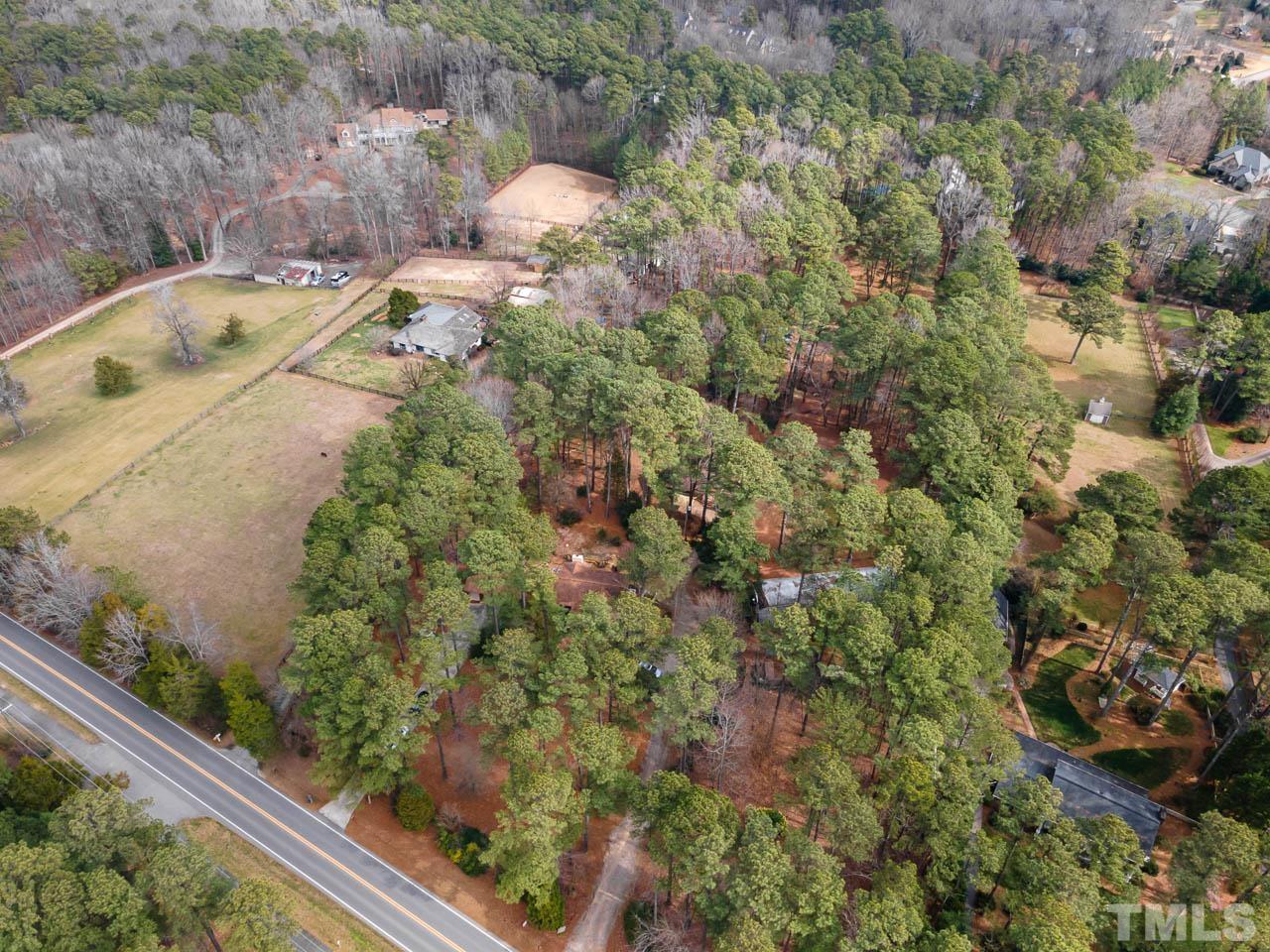 9006 Honeycutt Road Raleigh, NC 27615 - Photo 29 of 54 a view of a lake from a balcony